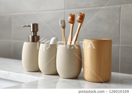 Modern bathroom set with bamboo toothbrushes and ceramic holders 126010109