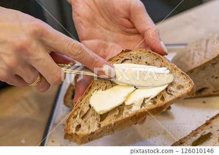 Cuts of freshly baked of home made rye bread 126010146