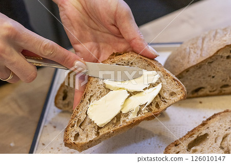 Cuts of freshly baked of home made rye bread 126010147