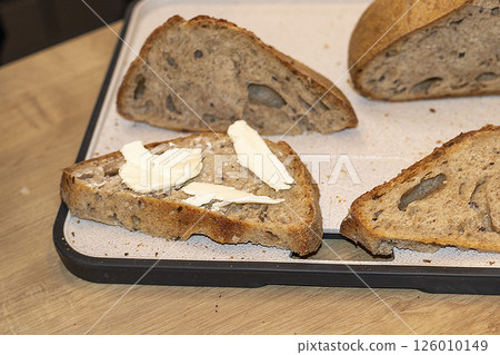 Cuts of freshly baked of home made rye bread Cuts of freshly baked of home made rye bread 126010149