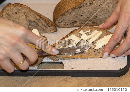 Cuts of freshly baked of home made rye bread Cuts of freshly baked of home made rye bread 126010150