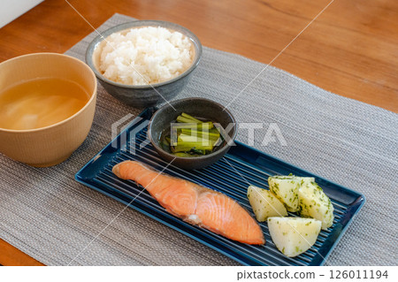 A simple Japanese breakfast of salmon and potatoes 126011194