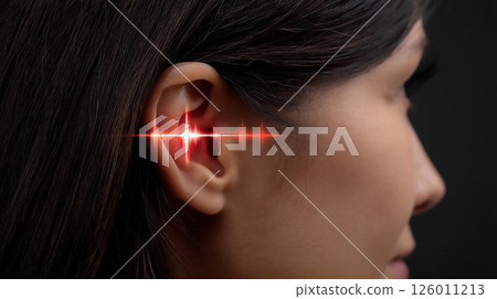 Sound wave visualization in a woman's ear showcases the connection between hearing and sound perception in a modern context 126011213