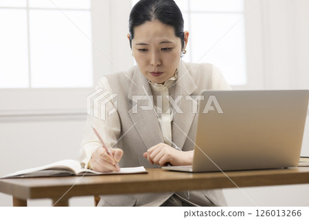 Women studying online Women studying online 126013266
