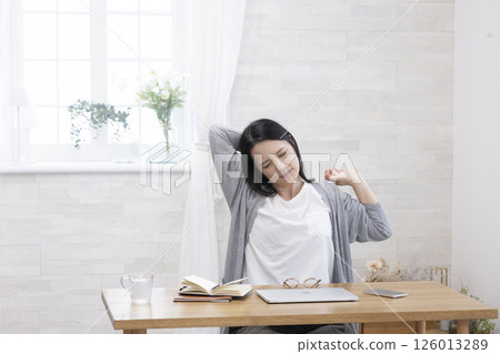 Tired middle-aged woman Tired middle-aged woman 126013289