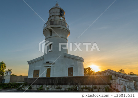 Yakushima Lighthouse, the white Yakushima Lighthouse shining in the midsummer sunset 126013531