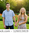 Young men and women holding hands 126013819
