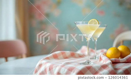 A joyful arrangement showcases two glasses of lemonade and a vase of spring flowers on a table, making it perfect for cocktails A joyful arrangement showcases two glasses of lemonade and a vase of spring flowers on a table, making it perfect for cocktails 126014361