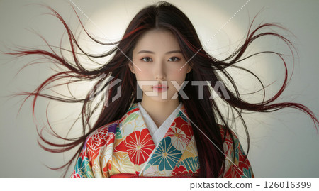 Portrait of a woman with red highlighted hair and colorful kimono 126016399