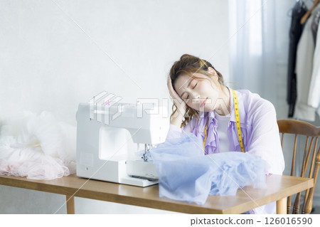 Woman doing dressmaking at home 126016590