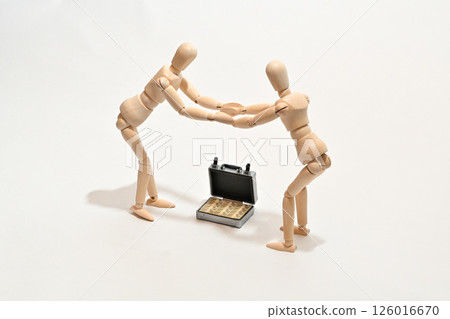 Business deal concluded Image of businessmen shaking hands with both hands Business deal concluded Image of businessmen shaking hands with both hands 126016670