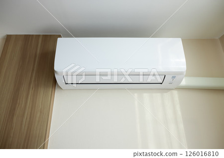 Air conditioner in room for cool climate. Air conditioner in room for cool climate. 126016810