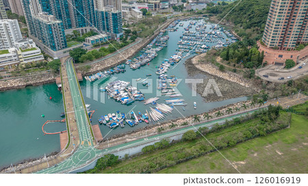 MAY 10 2025 View of a Large Urban Construction Site Amid Surrounding Greenery MAY 10 2025 View of a Large Urban Construction Site Amid Surrounding Greenery 126016919