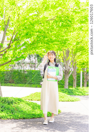 College student woman walking outside 126017603