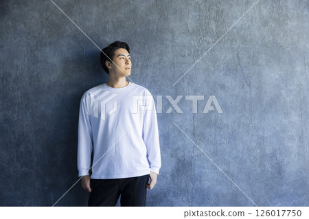 A man wearing a T-shirt A man wearing a T-shirt 126017750