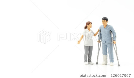 Miniature of a patient and nurse working hard on rehabilitation 126017967