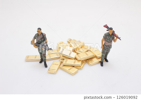 Toy Soldiers Protecting Pile of Gold Bars on White Background Toy Soldiers Protecting Pile of Gold Bars on White Background 126019092