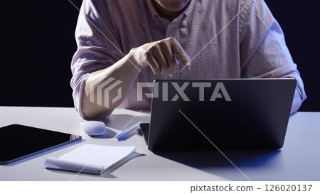People working together and sharing ideas in a modern business environment. 126020137
