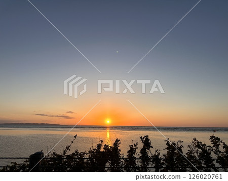 Sunset over the horizon Sunset over the horizon 126020761