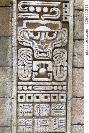 Ancient Mayan Stone Relief Intricately Carved with Mystical Symbols 126021351