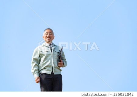 Senior man in work clothes Senior man in work clothes 126021842