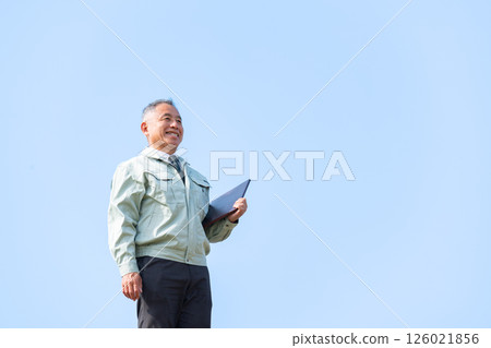 Senior man in work clothes Senior man in work clothes 126021856