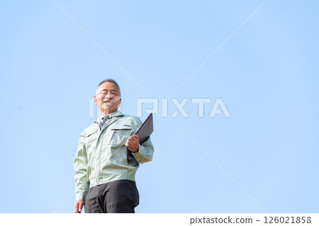 Senior man in work clothes Senior man in work clothes 126021858