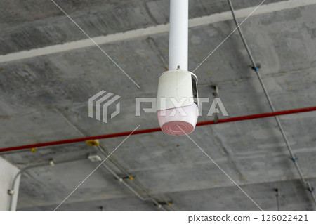 Close up to overhead LED status light of car parking in department store building. 126022421