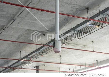 Close up to overhead LED status light of car parking in department store building. 126022422