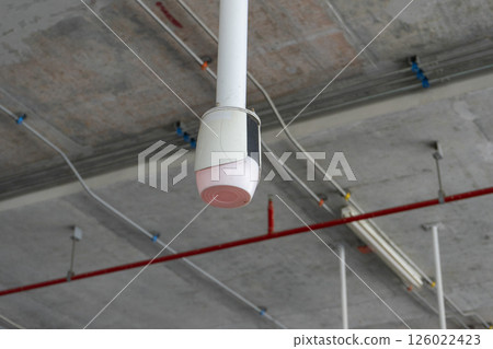 Close up to overhead LED status light of car parking in department store building. 126022423