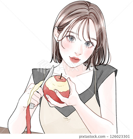 A woman peeling an apple 126023301