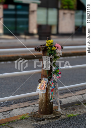 The bomb-damaged pump near the Hiroshima Electric Railway Enkobashi tram stop 126023336