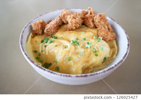 creamy omelet or omelet or omelette or fried egg with fried chicken or crispy chicken or chicken 126025427