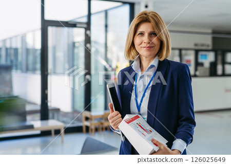 Portrait of female medical sales representative. 126025649