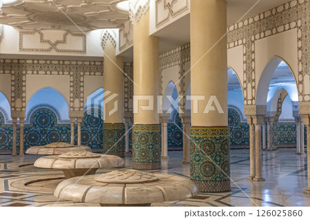 Muslim Ablution, pillars and stone seats at Mosque Hassan II, Casablanca, Morocco. Muslim Ablution, pillars and stone seats at Mosque Hassan II, Casablanca, Morocco. 126025860
