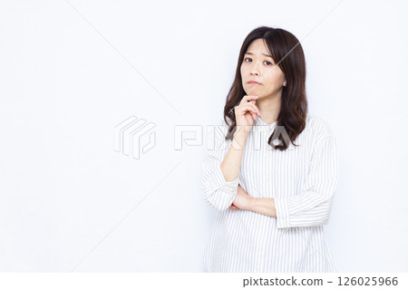 A woman who is seriously worried A woman who is seriously worried 126025966