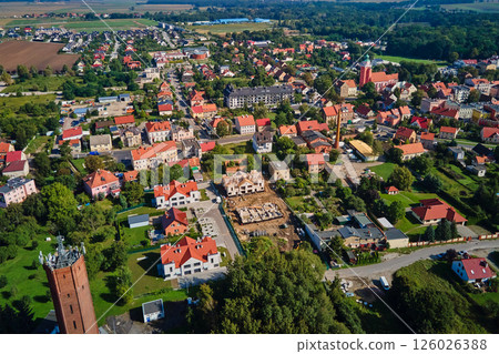 Aerial view of European town with residential buildings and construction site 126026388
