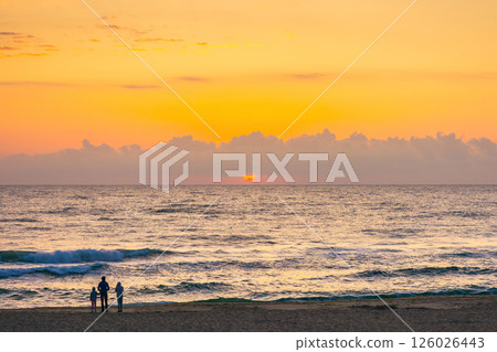 sunrise at the sea in summer with sun and cloudscape above horizon. vacation and relax scenery at twilight. dramatic weather 126026443