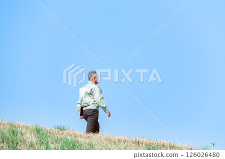 Back view of a man managing civil engineering construction work 126026480
