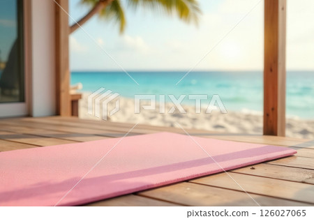 Sports activities on vacation, yoga mat on the terrace of the bungalow overlooking the ocean 126027065