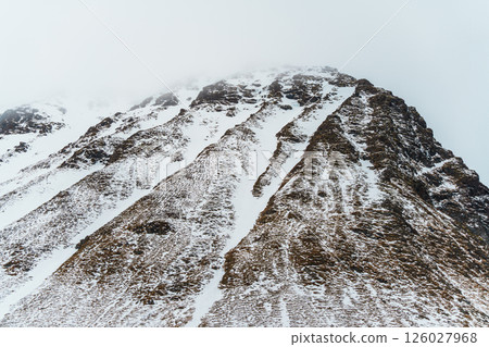 Snowy Landscape of a Mountain Range in Lofoten Snowy Landscape of a Mountain Range in Lofoten 126027968
