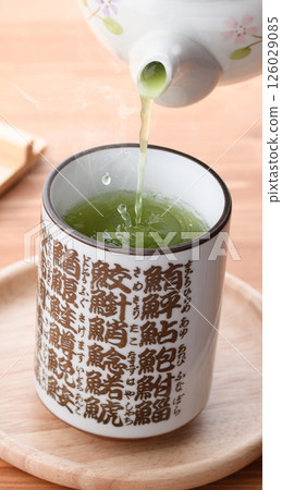Enjoy matcha in a sushi teacup Enjoy matcha in a sushi teacup 126029085