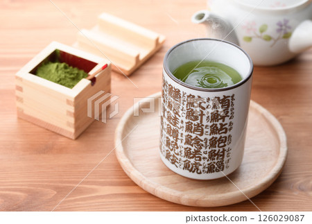 Enjoy matcha in a sushi teacup Enjoy matcha in a sushi teacup 126029087
