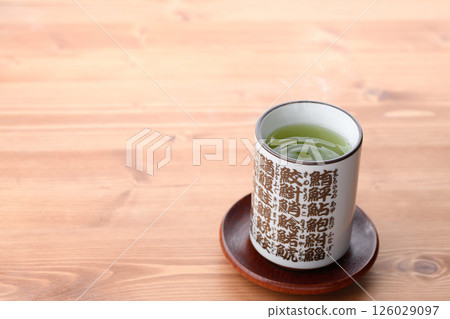 Enjoy matcha in a sushi teacup 126029097