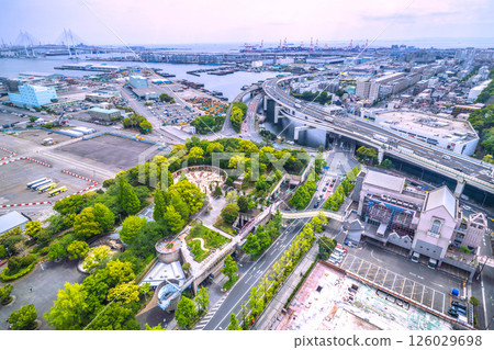 Yokohama cityscape, Japan. Queen Elizabeth at Daikoku Pier. (3 other luxury cruise ships are currently anchored at Yokohama Port.) Yokohama cityscape, Japan. Queen Elizabeth at Daikoku Pier. (3 other luxury cruise ships are currently anchored at Yokohama Port.) 126029698