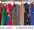 Colorful Traditional Women's Dresses on Display at a Street Market in Senegal 126029744