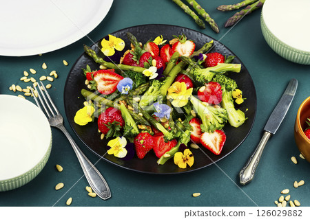 Vegetable salad with strawberries. 126029882