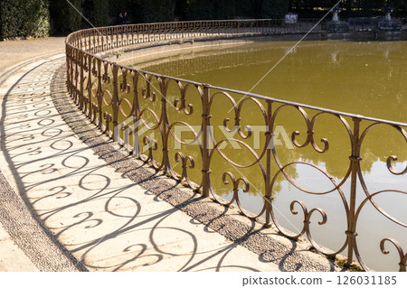 Metal fence in the park Metal fence in the park 126031185