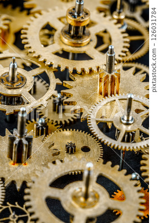 Close up old mechanism on a black background... Close up old mechanism on a black background... 126031784
