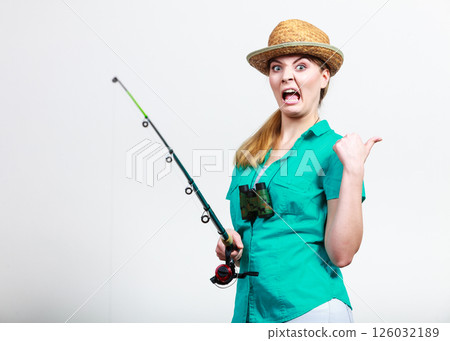Woman with fishing rod, spinning equipment Woman with fishing rod, spinning equipment 126032189